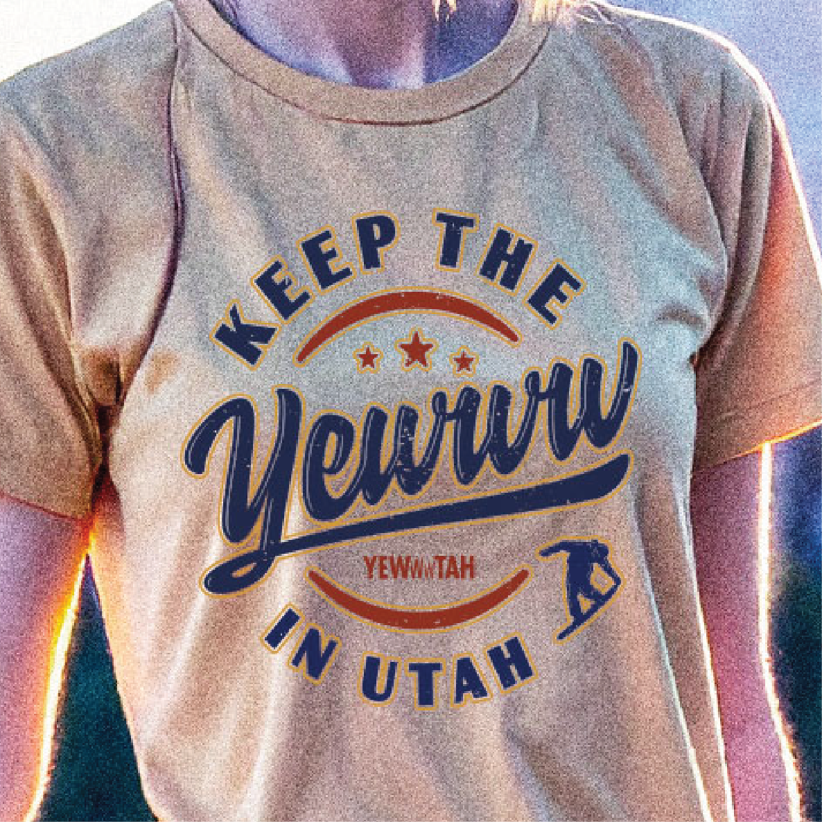 T-shirt with 'Keep the Yewww in Utah' text and graphics on a person wearing it.