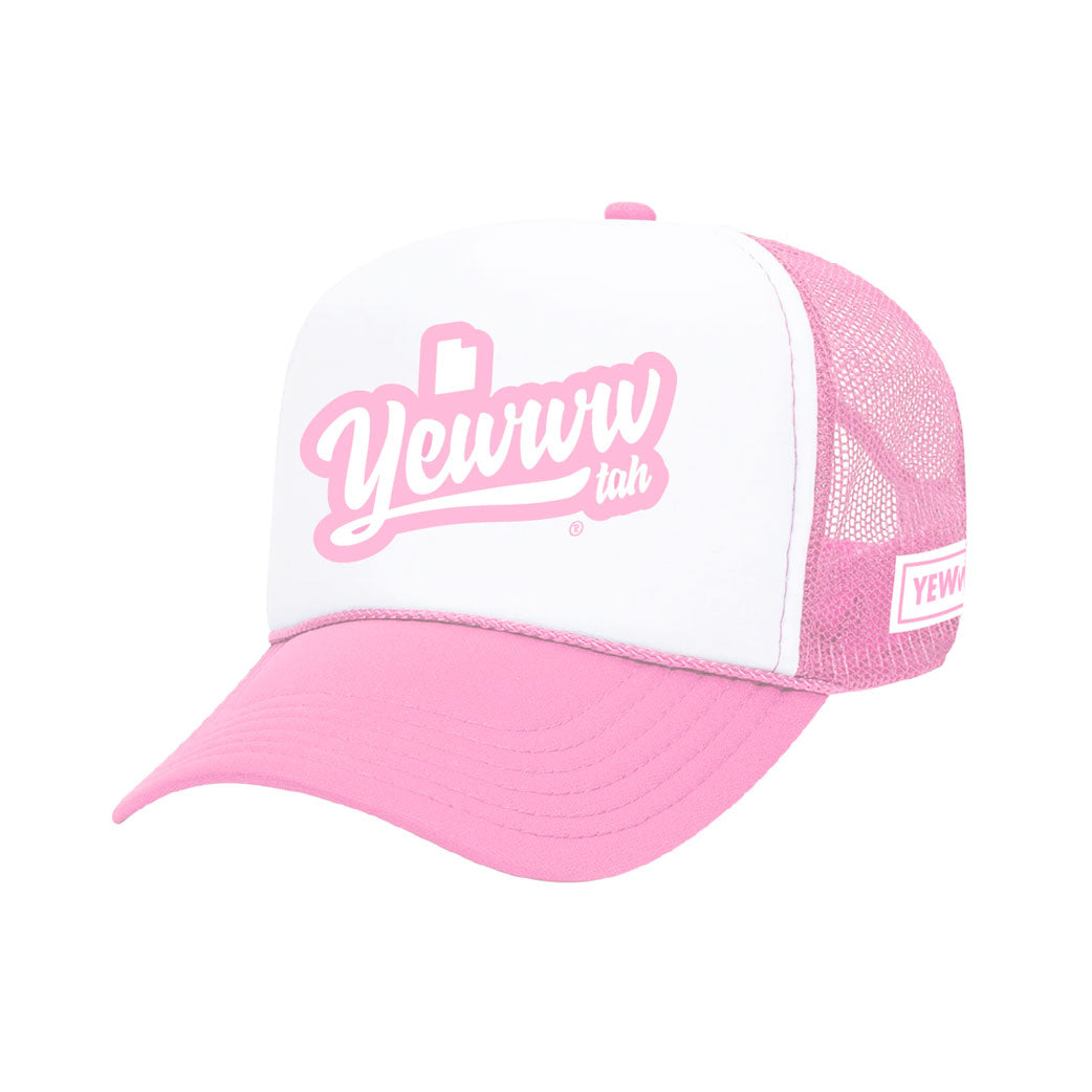 Pink and white foam trucker hat with printed 'Yewwwtah' logo on a white background
