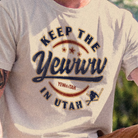 T-shirt with 'Keep the Yewww in Utah' text and graphics on a person wearing it.