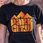 Black t-shirt with 'Park City' graphic design featuring orange and yellow text.