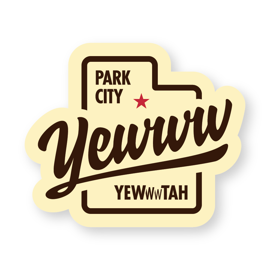 Sticker with 'Park City Yewww Yewwwtah' logo on a cream background